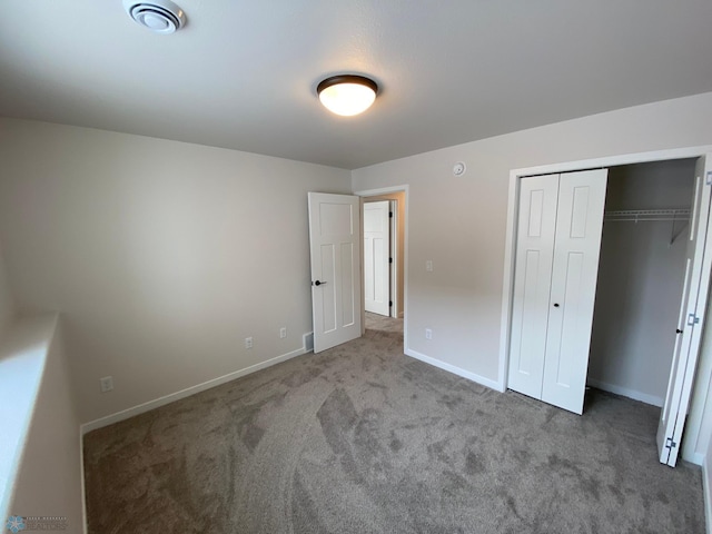 1312 Southview Dr SW, Glyndon, MN 56547 - unfurnished bedroom featuring carpet floors, baseboards, and a closet