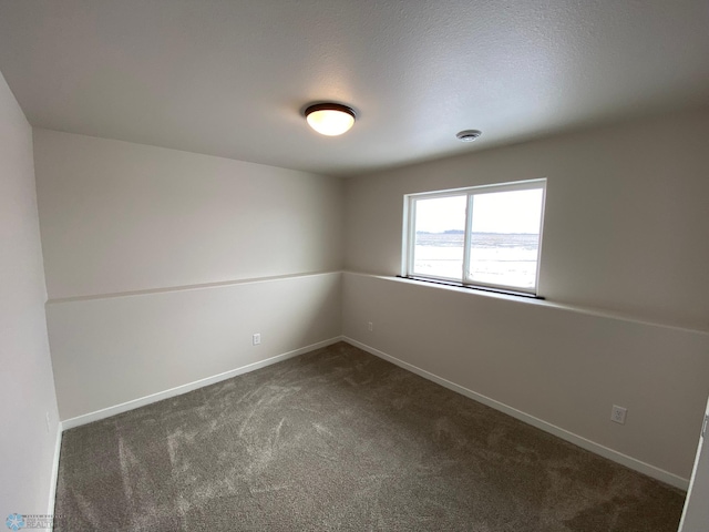 1312 Southview Dr SW, Glyndon, MN 56547 - carpeted spare room featuring baseboards