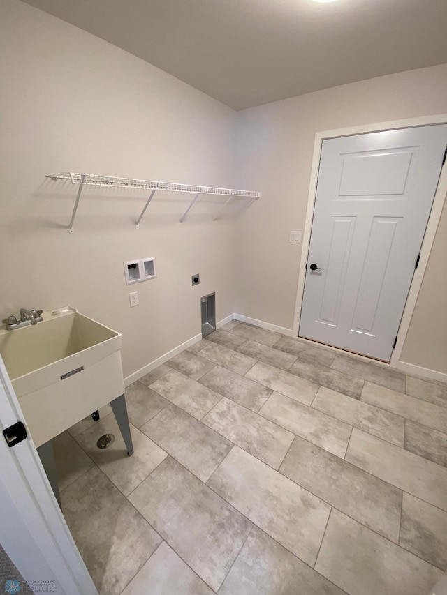 1312 Southview Dr SW, Glyndon, MN 56547 - laundry area featuring washer hookup, baseboards, and electric dryer hookup