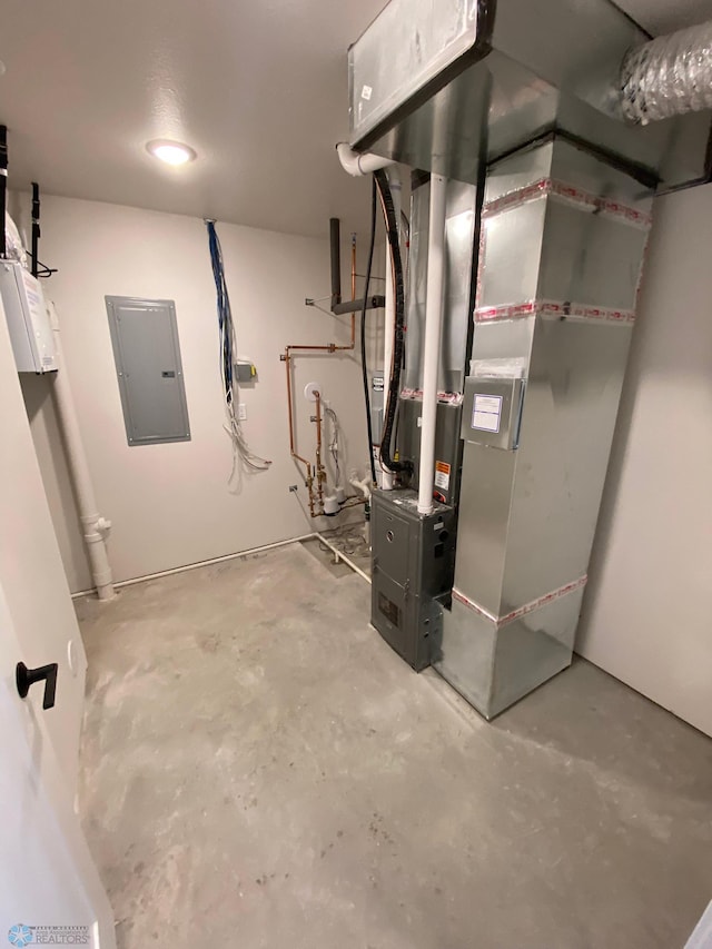 1312 Southview Dr SW, Glyndon, MN 56547 - utility room featuring electric panel and heating unit