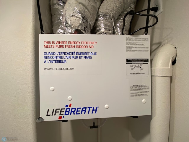 1312 Southview Dr SW, Glyndon, MN 56547 - detailed view of a textured wall and tankless water heater