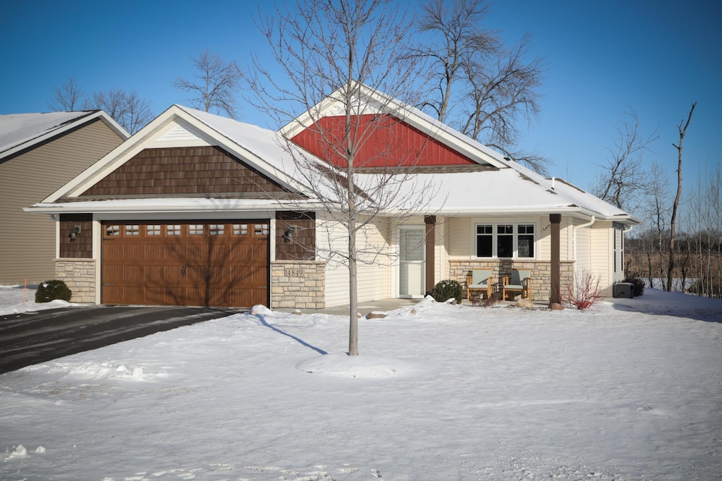 craftsman inspired home featuring a garage