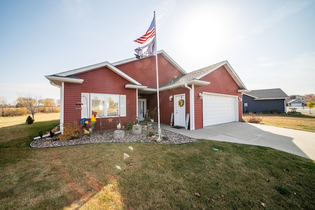 view of front of home with a front yard and a garage