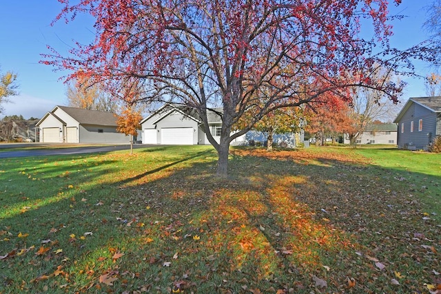 view of yard featuring a garage