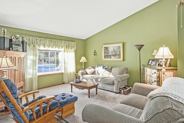 living room with lofted ceiling and light carpet