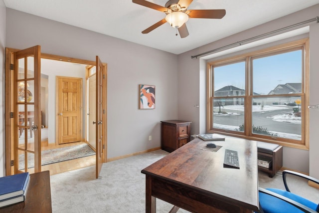 home office with light colored carpet and ceiling fan