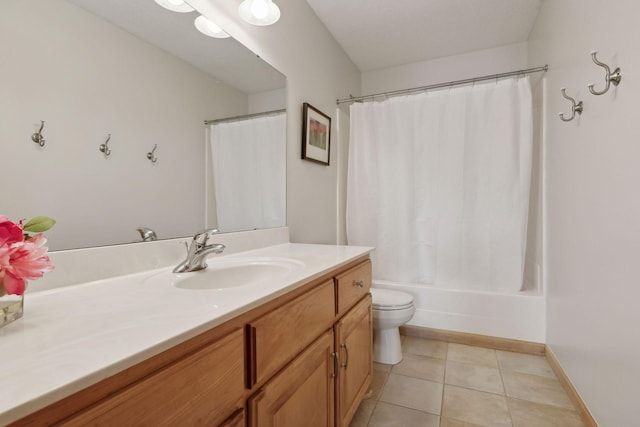 full bathroom with vanity, toilet, tile patterned flooring, and shower / bath combo