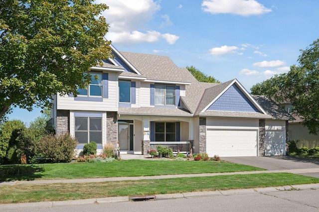 craftsman-style house with a garage, a porch, and a front lawn