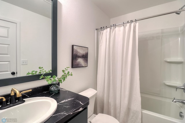 full bathroom with vanity, toilet, and shower / tub combo with curtain