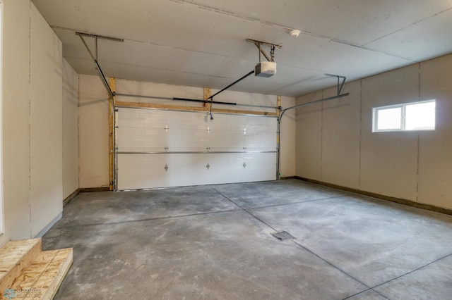 garage featuring a garage door opener