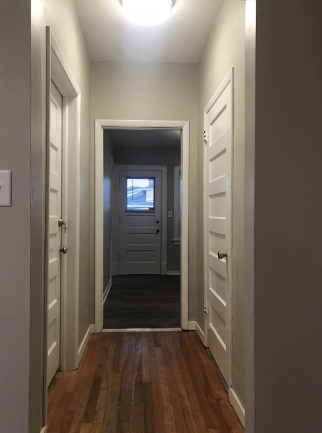 entryway with dark wood-type flooring