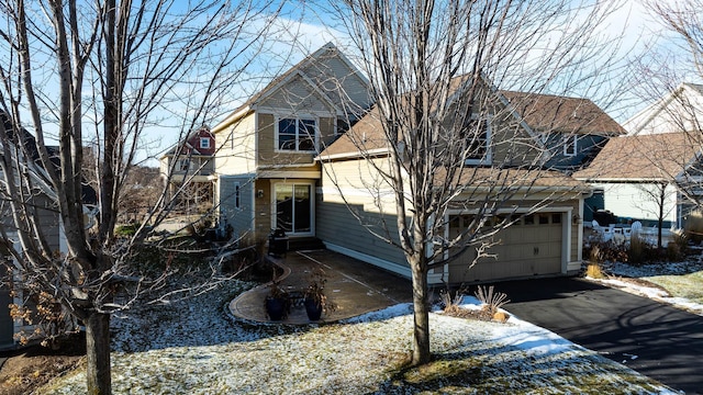 view of front of property with a garage