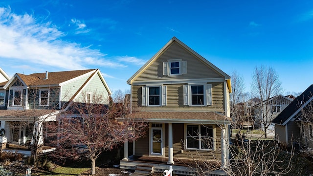 traditional-style home with covered porch