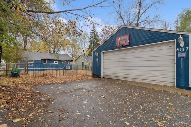 garage featuring central AC unit