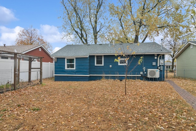 rear view of house with ac unit