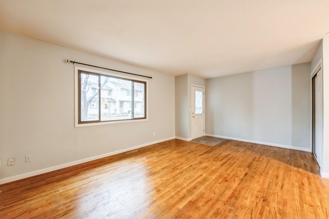 empty room featuring light hardwood / wood-style floors