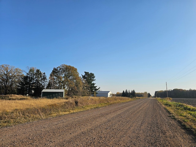 view of road featuring a rural view