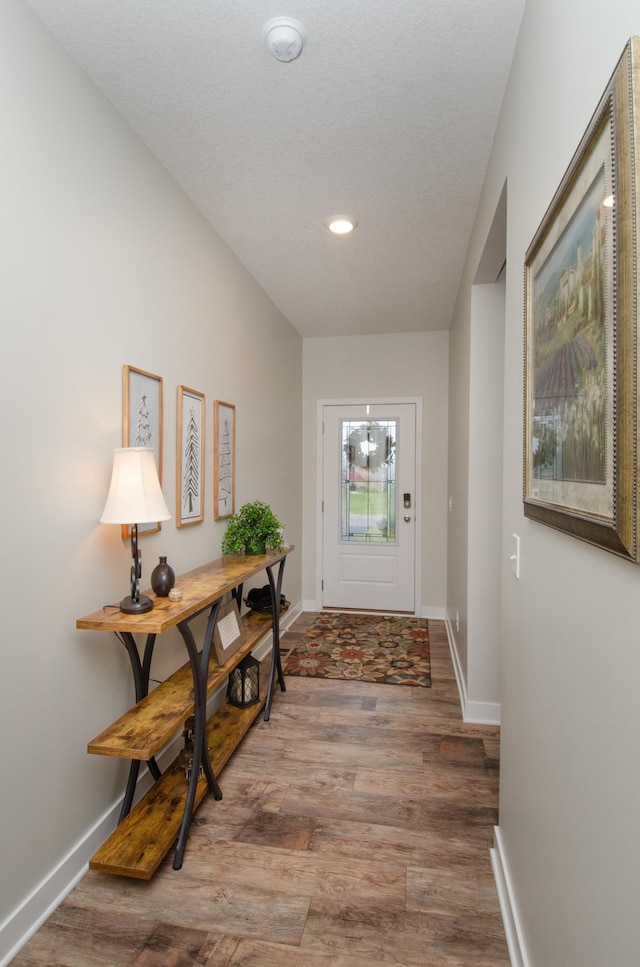 19266 Hunters Pl, Rogers, MN 55374 - foyer entrance with wood finished floors, baseboards, and recessed lighting