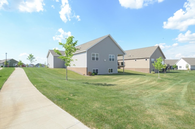 19266 Hunters Pl, Rogers, MN 55374 - view of property exterior with a residential view and a lawn