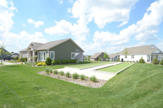 19266 Hunters Pl, Rogers, MN 55374 - view of side of home with a bocce ball area, a lawn, and a residential view