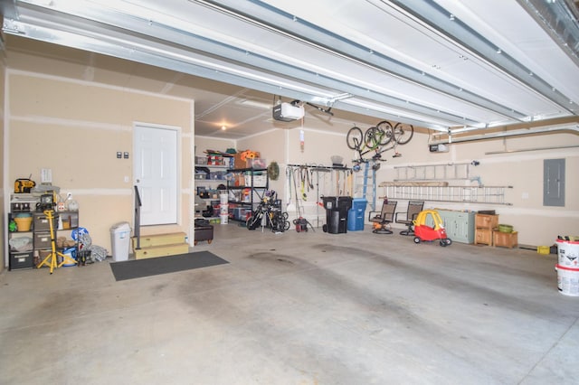 19266 Hunters Pl, Rogers, MN 55374 - garage with a garage door opener and electric panel