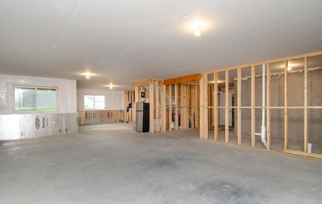 19266 Hunters Pl, Rogers, MN 55374 - below grade area featuring freestanding refrigerator