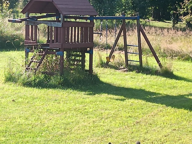 view of play area featuring a yard