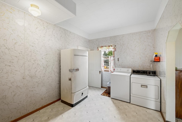 laundry room featuring independent washer and dryer