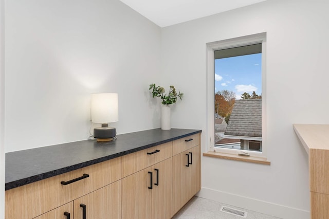 interior space with light brown cabinetry