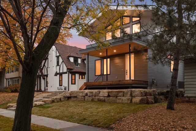 view of front of house with a yard