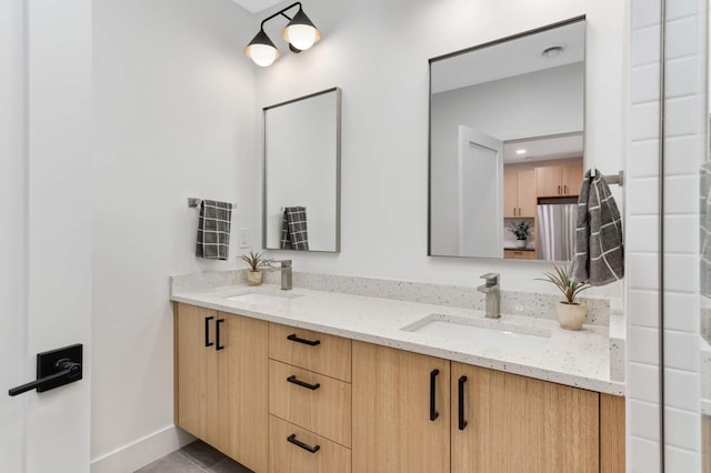 bathroom with vanity and tile patterned floors