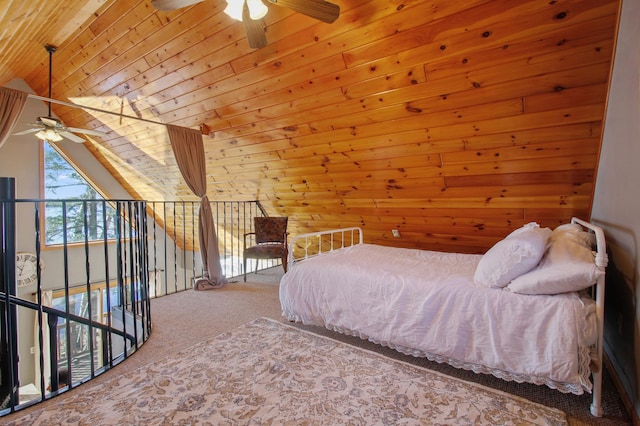 carpeted bedroom featuring wood walls, wood ceiling, and lofted ceiling