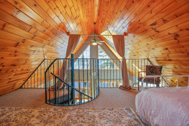 unfurnished bedroom featuring lofted ceiling, carpet, wood walls, and wooden ceiling