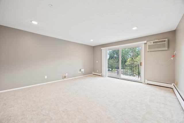 unfurnished room featuring baseboard heating, an AC wall unit, and light carpet