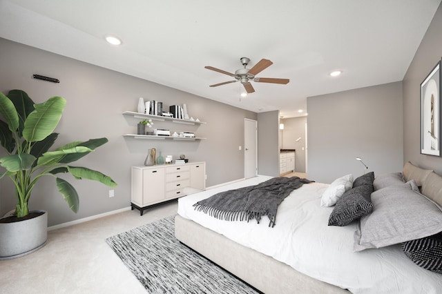 carpeted bedroom with ceiling fan