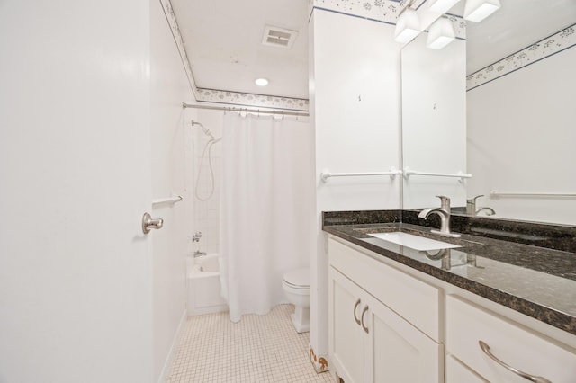 full bathroom featuring vanity, tile patterned floors, toilet, and shower / bathtub combination with curtain