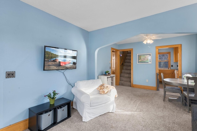 interior space featuring sink and carpet flooring