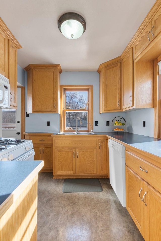 kitchen featuring sink and white appliances