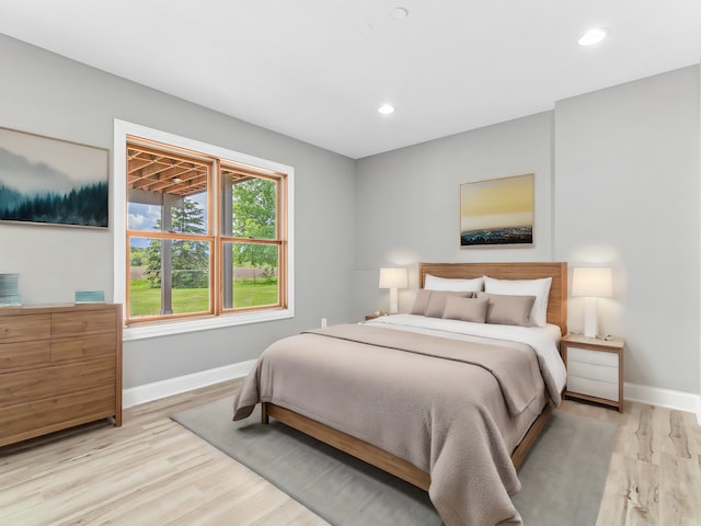 bedroom featuring light hardwood / wood-style flooring