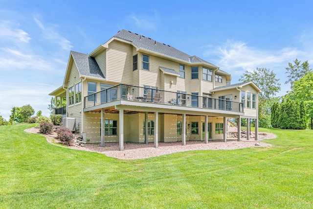 back of house with central AC, a lawn, a patio area, and a deck