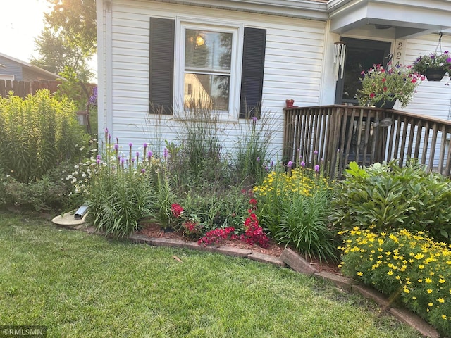 view of property exterior featuring a yard