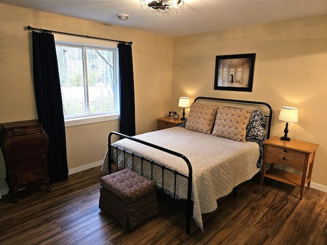 bedroom featuring dark hardwood / wood-style floors