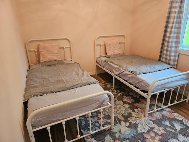 bedroom featuring hardwood / wood-style flooring