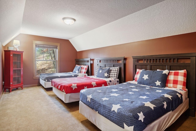 carpeted bedroom with lofted ceiling and a textured ceiling