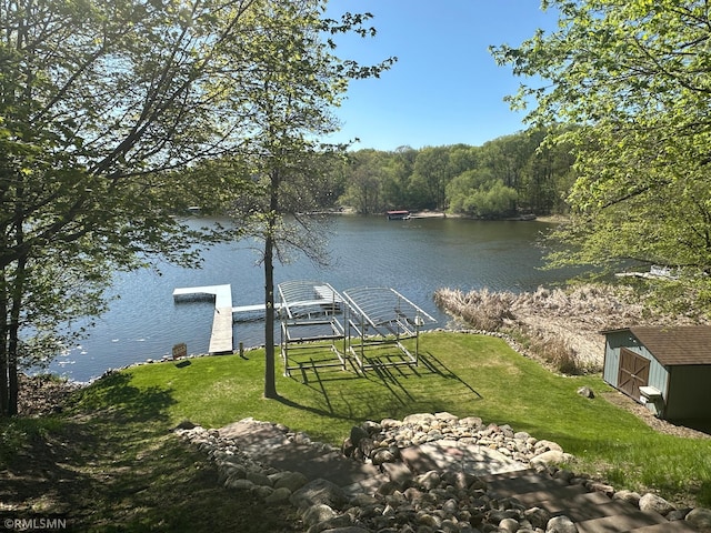 8834 Bishop Ave NW, Maple Lake, MN 55358 - dock with a water view, a yard, and a forest view