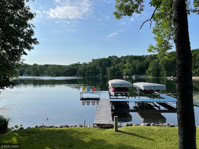 8834 Bishop Ave NW, Maple Lake, MN 55358 - dock with a forest view, a water view, and boat lift