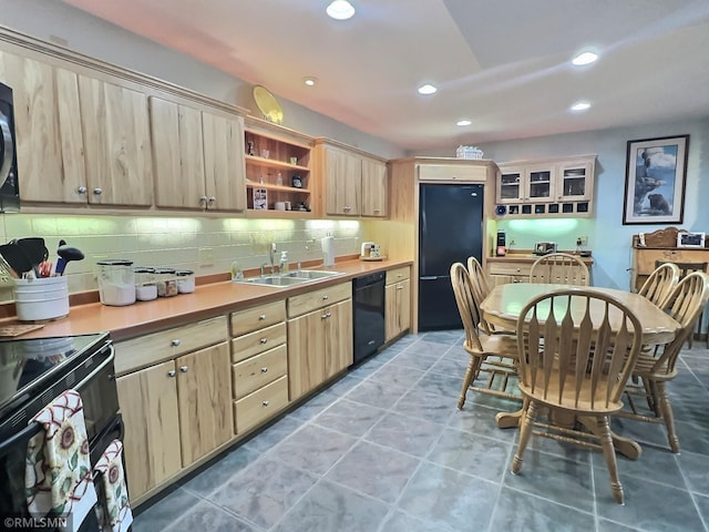 8834 Bishop Ave NW, Maple Lake, MN 55358 - kitchen with a sink, black appliances, light brown cabinets, tasteful backsplash, and recessed lighting