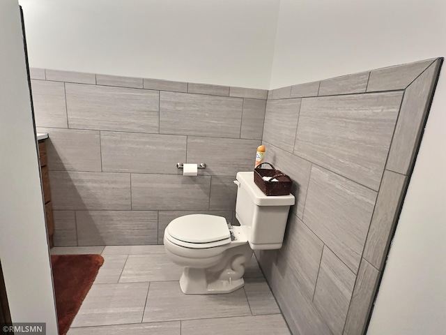 8834 Bishop Ave NW, Maple Lake, MN 55358 - bathroom featuring toilet and tile walls
