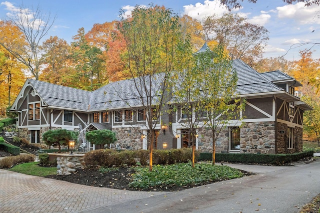 view of front of property with a sunroom