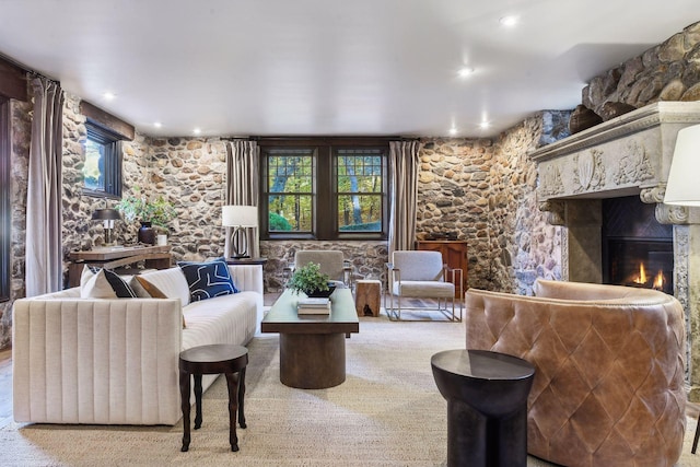 carpeted living room featuring plenty of natural light